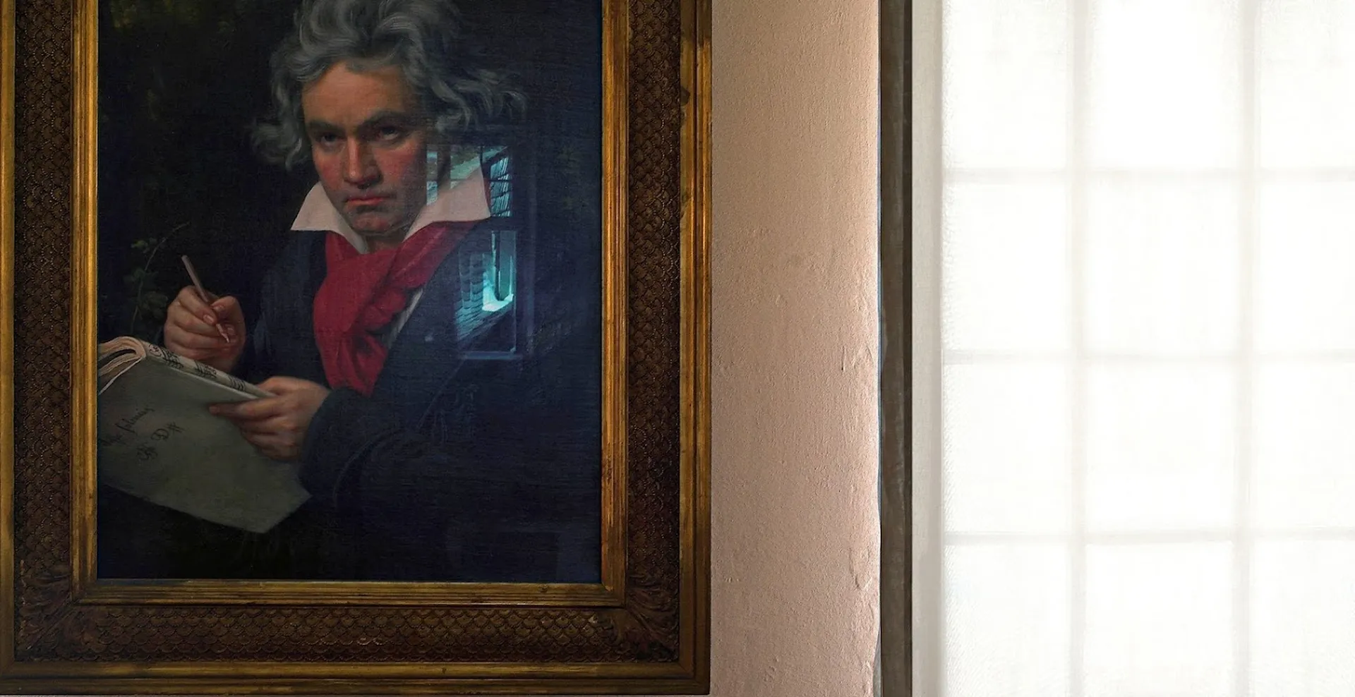 The most famous Beethoven portrait shows the composer with a red scarf, quill and music book. It hangs in the museum's permanent exhibition. A window of the room in which it is located is reflected in the portrait.